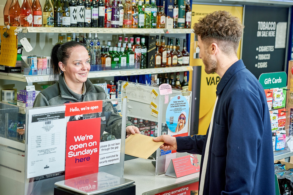 Convenience colleague serving a customer