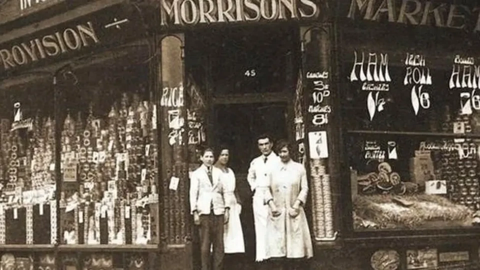 Historical Morrisons store with colleagues in old fashioned uniforms