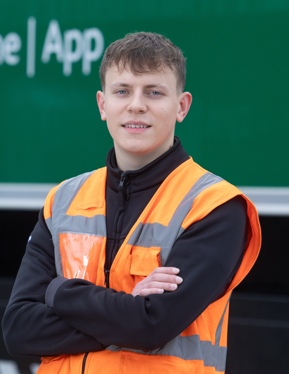 Luca headshot in front of lorry