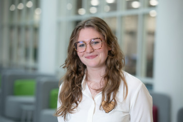 Smiling female colleague in Hilmore House